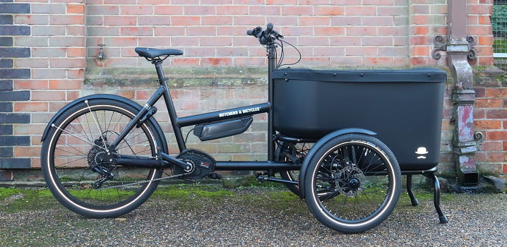 Black electric delivery bike with purpose-built front storage